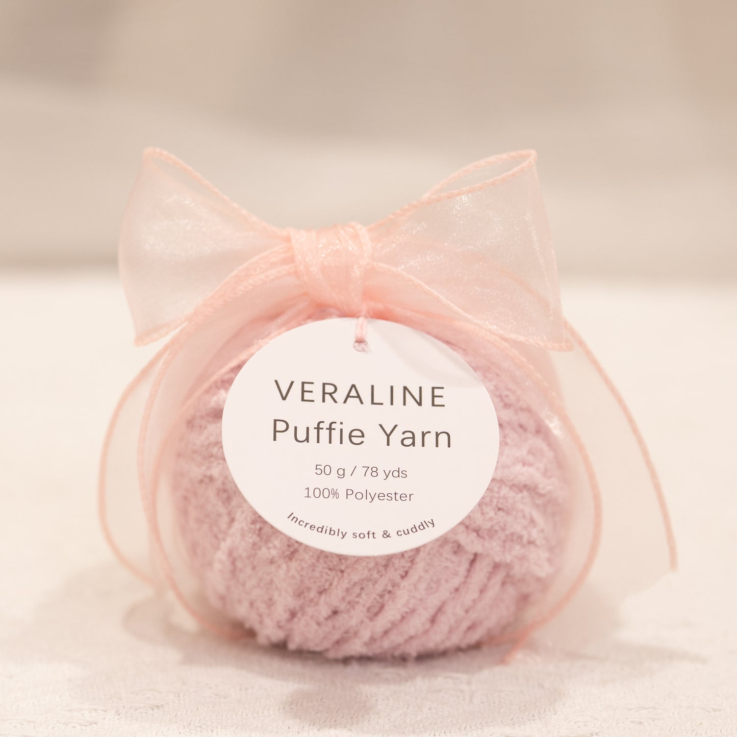 Veraline Puffie Yarn 02 Lilac Sugar Purple soft fluffy polyester yarn skein for knitting, crochet, and plush craft projects