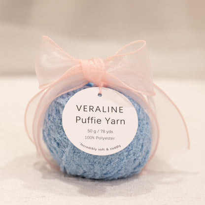Veraline Puffie Yarn 04 Sky Whip Blue soft fluffy polyester yarn skein for knitting, crochet, and plush craft projects