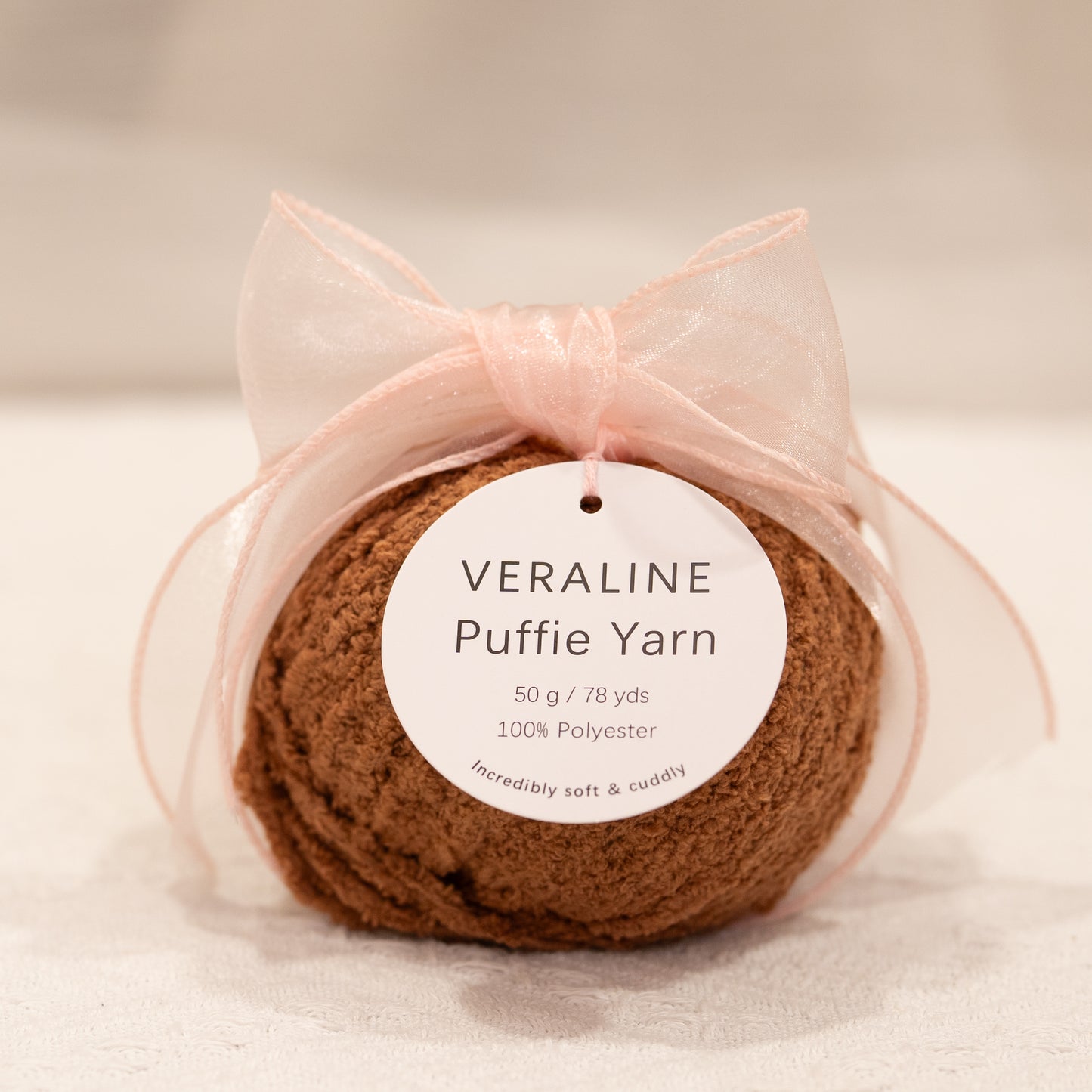 Veraline Puffie Yarn 10 Burnt Sugar Brown soft fluffy polyester yarn skein for knitting, crochet, and plush craft projects