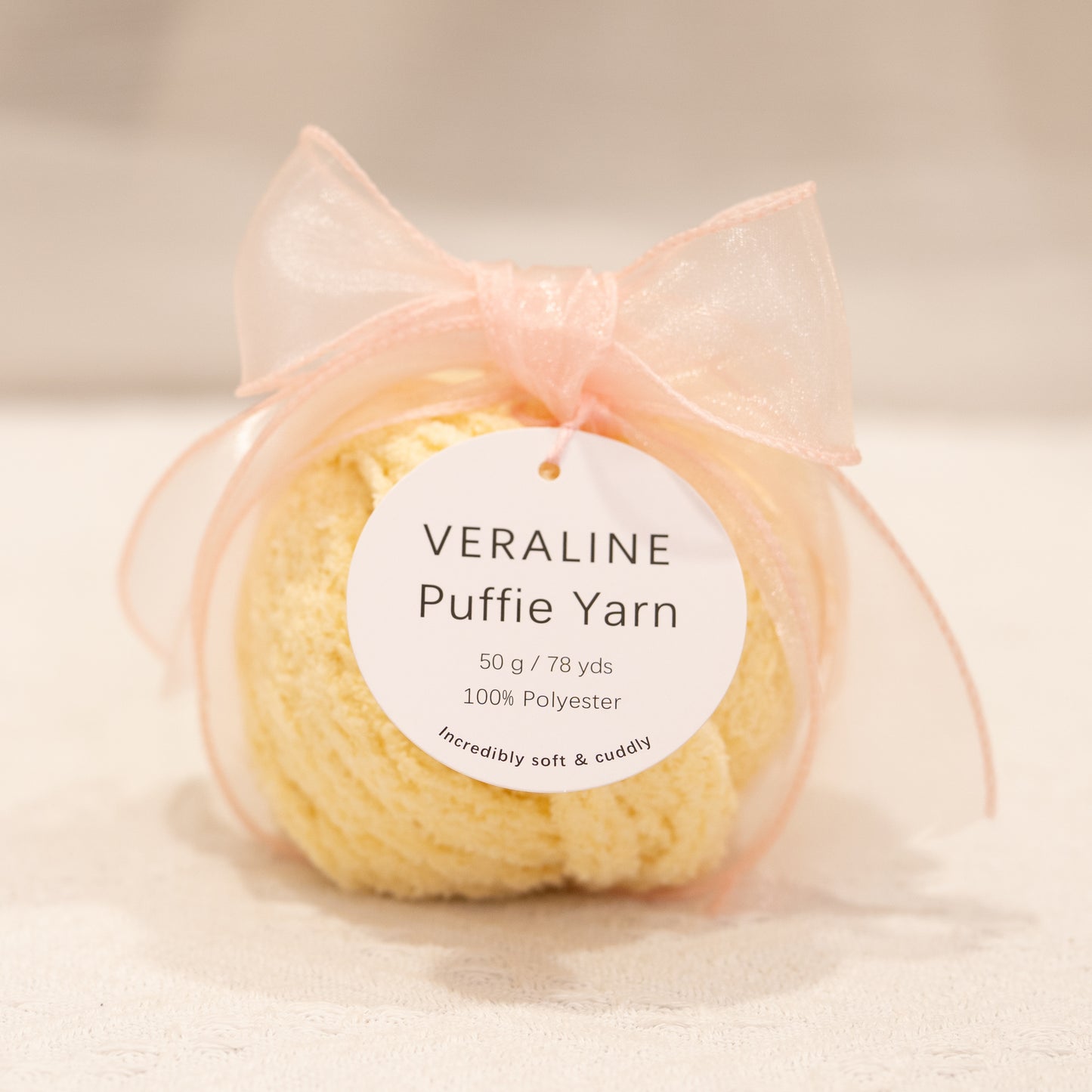 Veraline Puffie Yarn 11 Buttercream Yellow soft fluffy polyester yarn skein for knitting, crochet, and plush craft projects