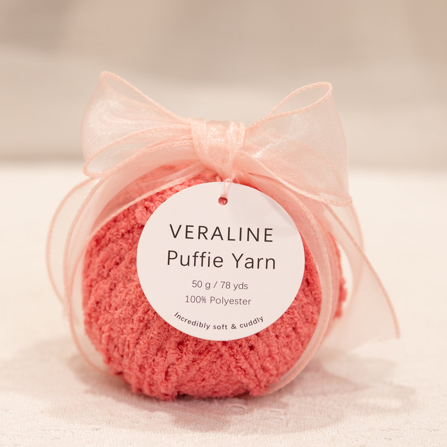 Veraline Puffie Yarn 15 Peachy Rose Pink soft fluffy polyester yarn skein for knitting, crochet, and plush craft projects