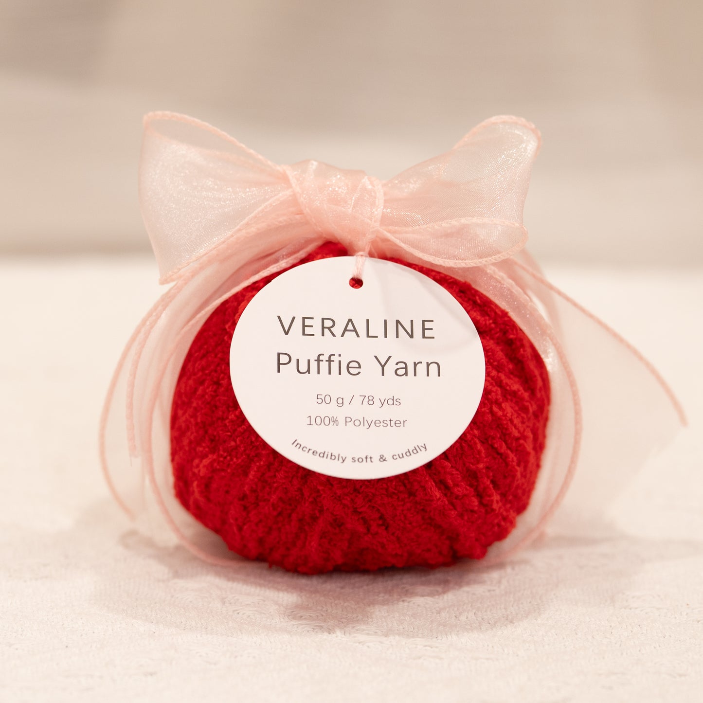 Veraline Puffie Yarn 20 Red Velvet Cherry soft fluffy polyester yarn skein for knitting, crochet, and plush craft projects