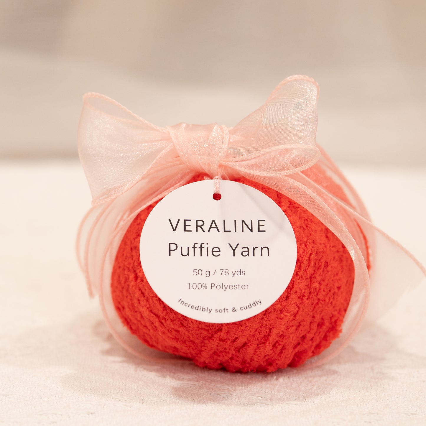 Veraline Puffie Yarn 21 Papaya Sorbet Orange soft fluffy polyester yarn skein for knitting, crochet, and plush craft projects