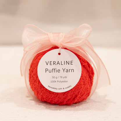 Veraline Puffie Yarn 23 Sunset Punch Orange soft fluffy polyester yarn skein for knitting, crochet, and plush craft projects