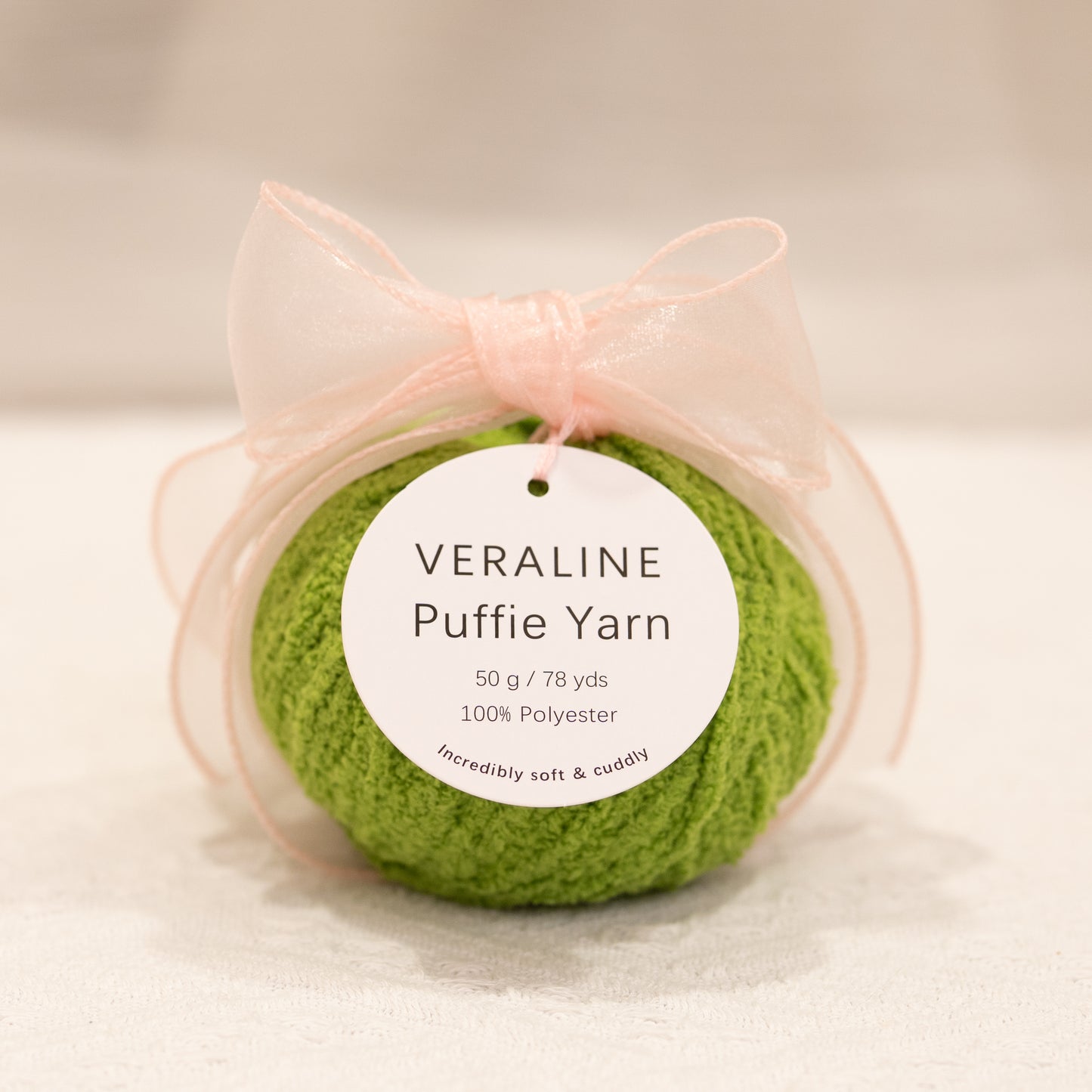 Veraline Puffie Yarn 27 Matcha Soufflé Green soft fluffy polyester yarn skein for knitting, crochet, and plush craft projects