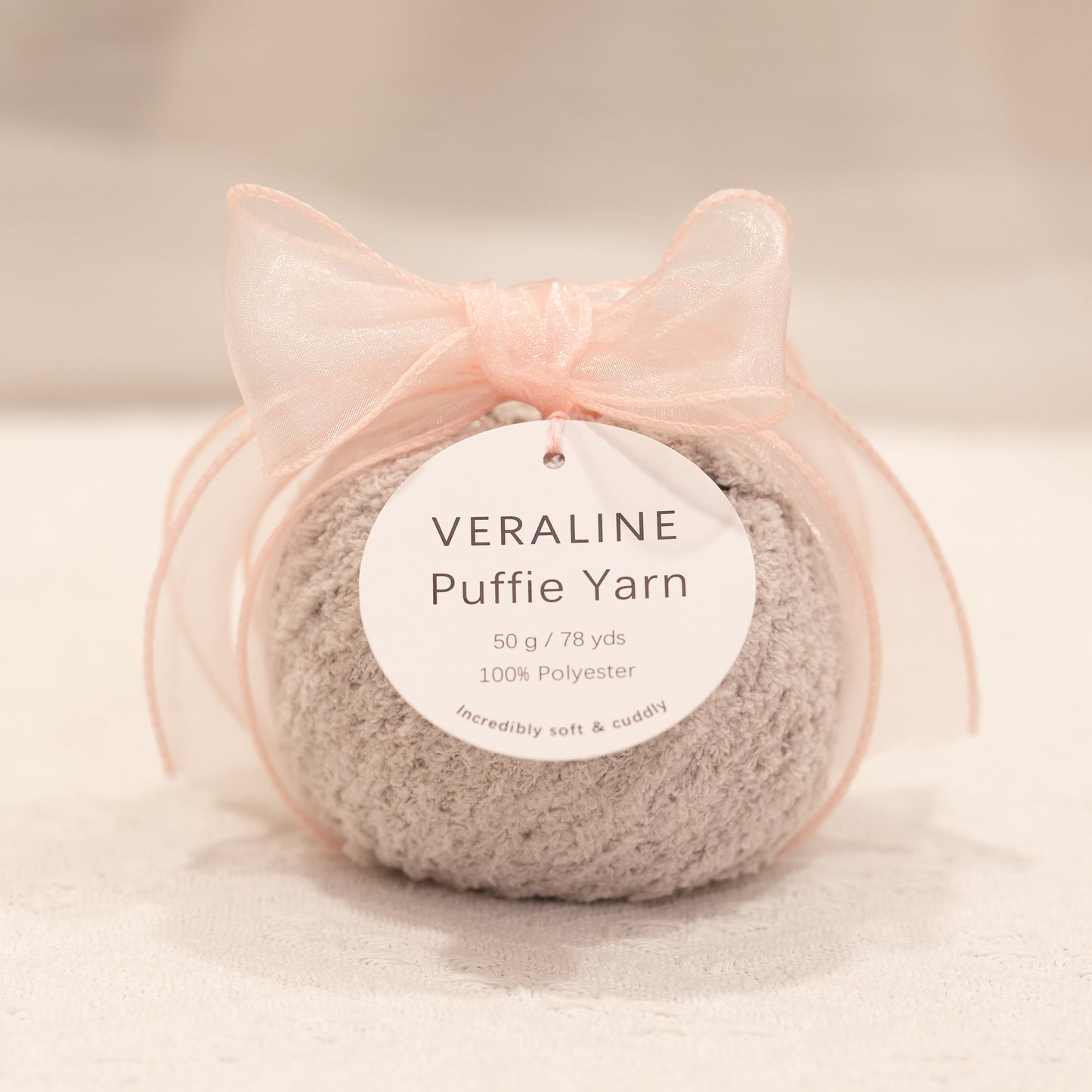 Veraline Puffie Yarn 28 Cloud Whip Gray soft fluffy polyester yarn skein for knitting, crochet, and plush craft projects