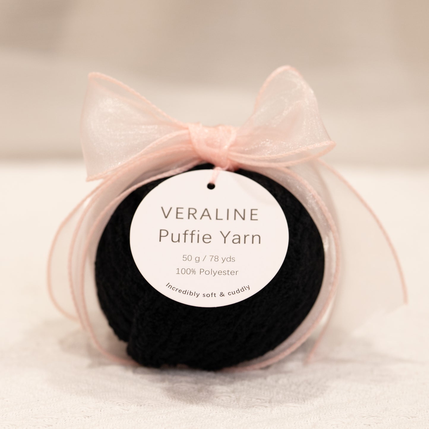 Veraline Puffie Yarn 29 Midnight Licorice soft fluffy polyester yarn skein for knitting, crochet, and plush craft projects