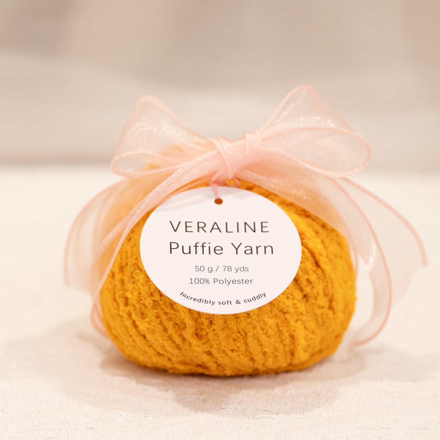 Veraline Puffie Yarn 35 Golden Toffee soft fluffy polyester yarn skein for knitting, crochet, and plush craft projects