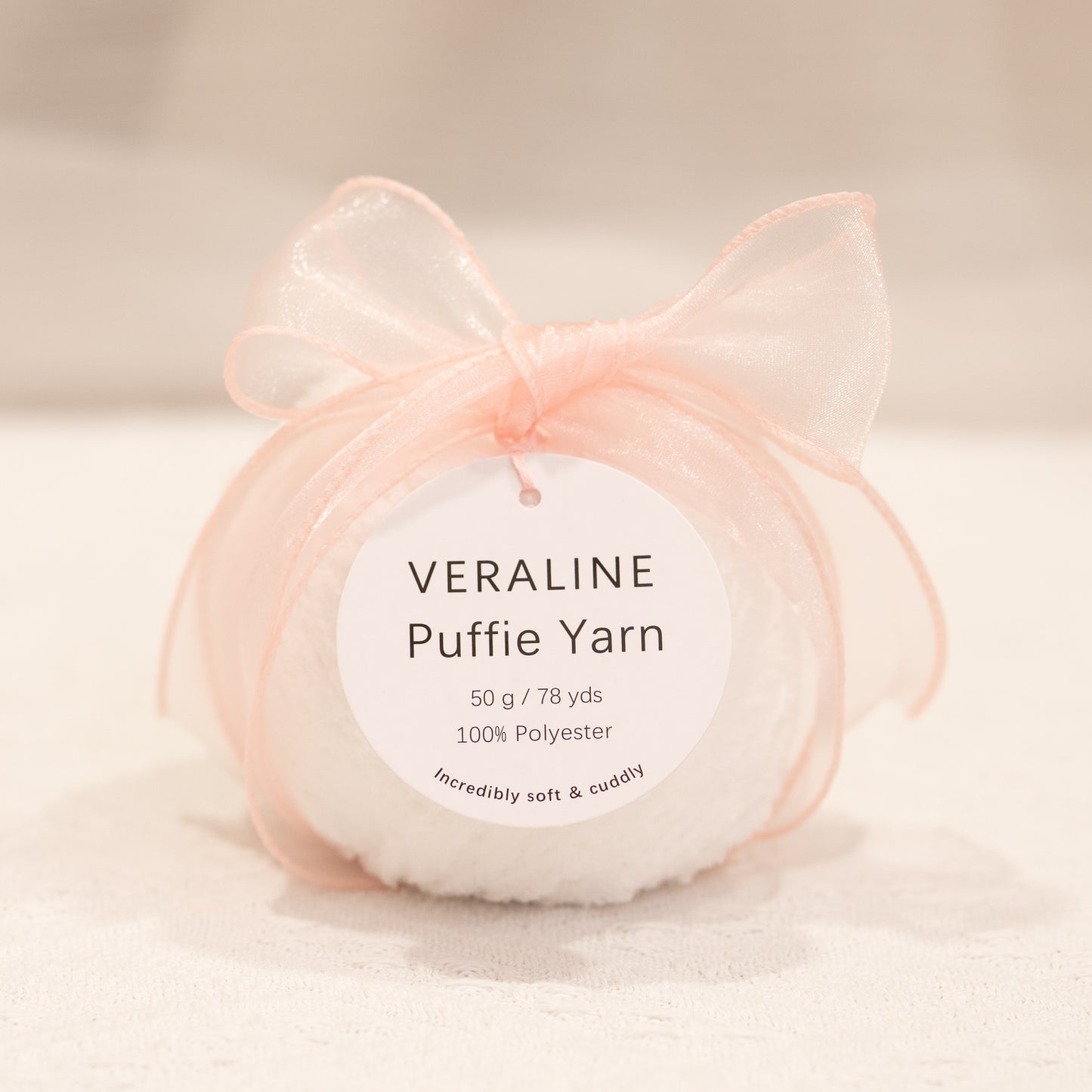 Veraline Puffie Yarn 37 Pure Snow White soft fluffy polyester yarn skein for knitting, crochet, and plush craft projects