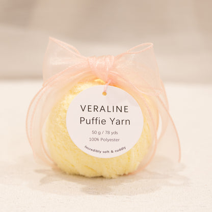 Veraline Puffie Yarn 39 Lemon Soufflé soft fluffy polyester yarn skein for knitting, crochet, and plush craft projects