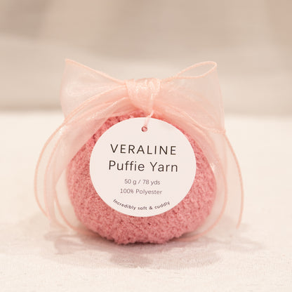 Veraline Puffie Yarn 40 Rose Soufflé Pink soft fluffy polyester yarn skein for knitting, crochet, and plush craft projects