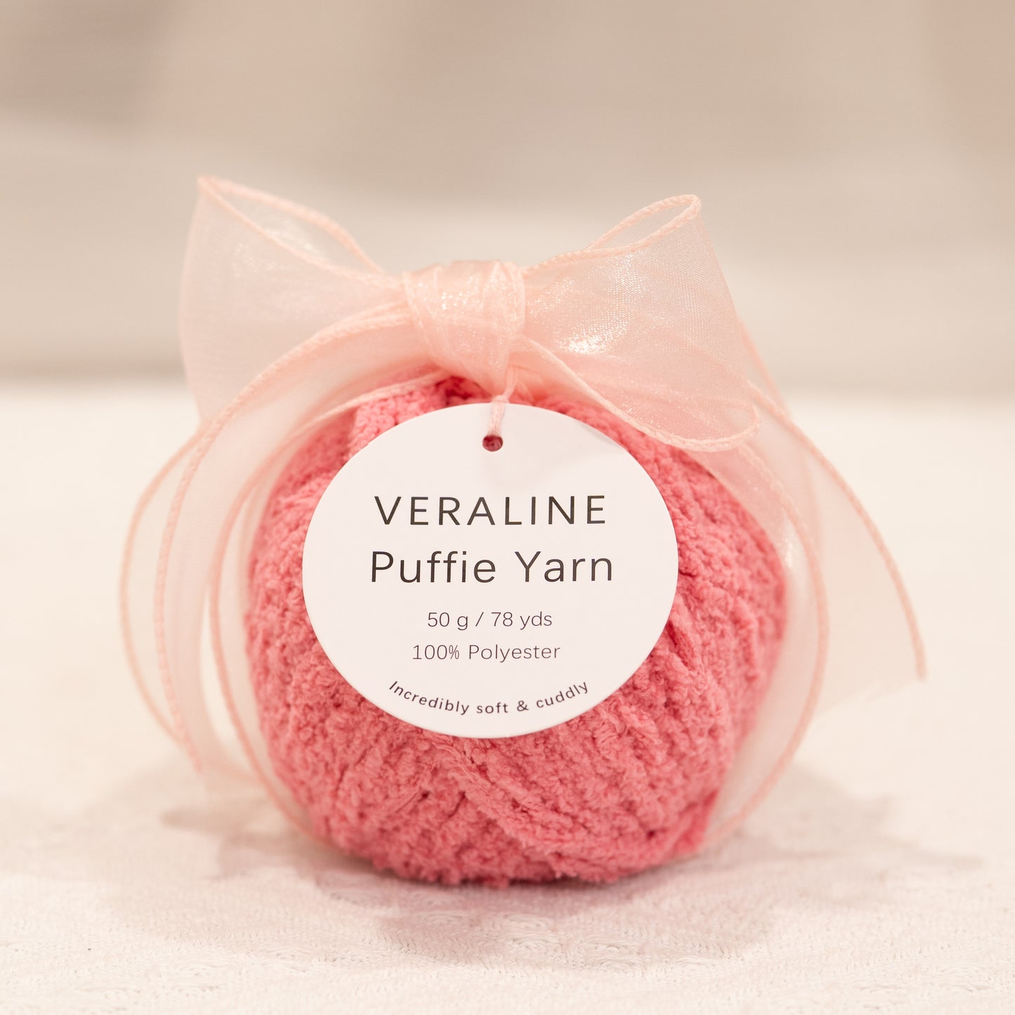Veraline Puffie Yarn 42 Strawberry Cream Pink soft fluffy polyester yarn skein for knitting, crochet, and plush craft projects