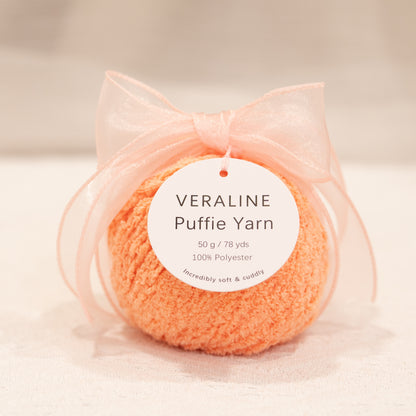 Veraline Puffie Yarn 46 Coral Cream soft fluffy polyester yarn skein for knitting, crochet, and plush craft projects
