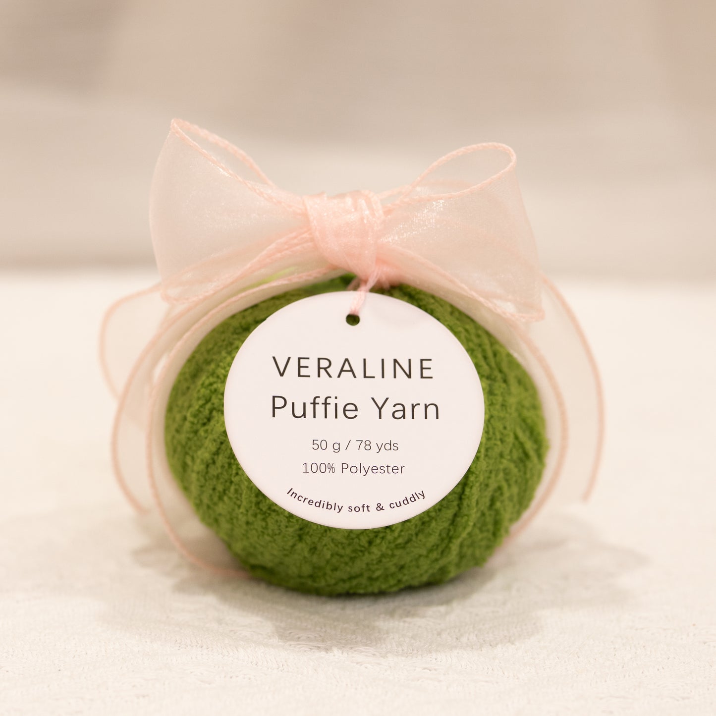 Veraline Puffie Yarn 48 Olive Drizzle soft fluffy polyester yarn skein for knitting, crochet, and plush craft projects