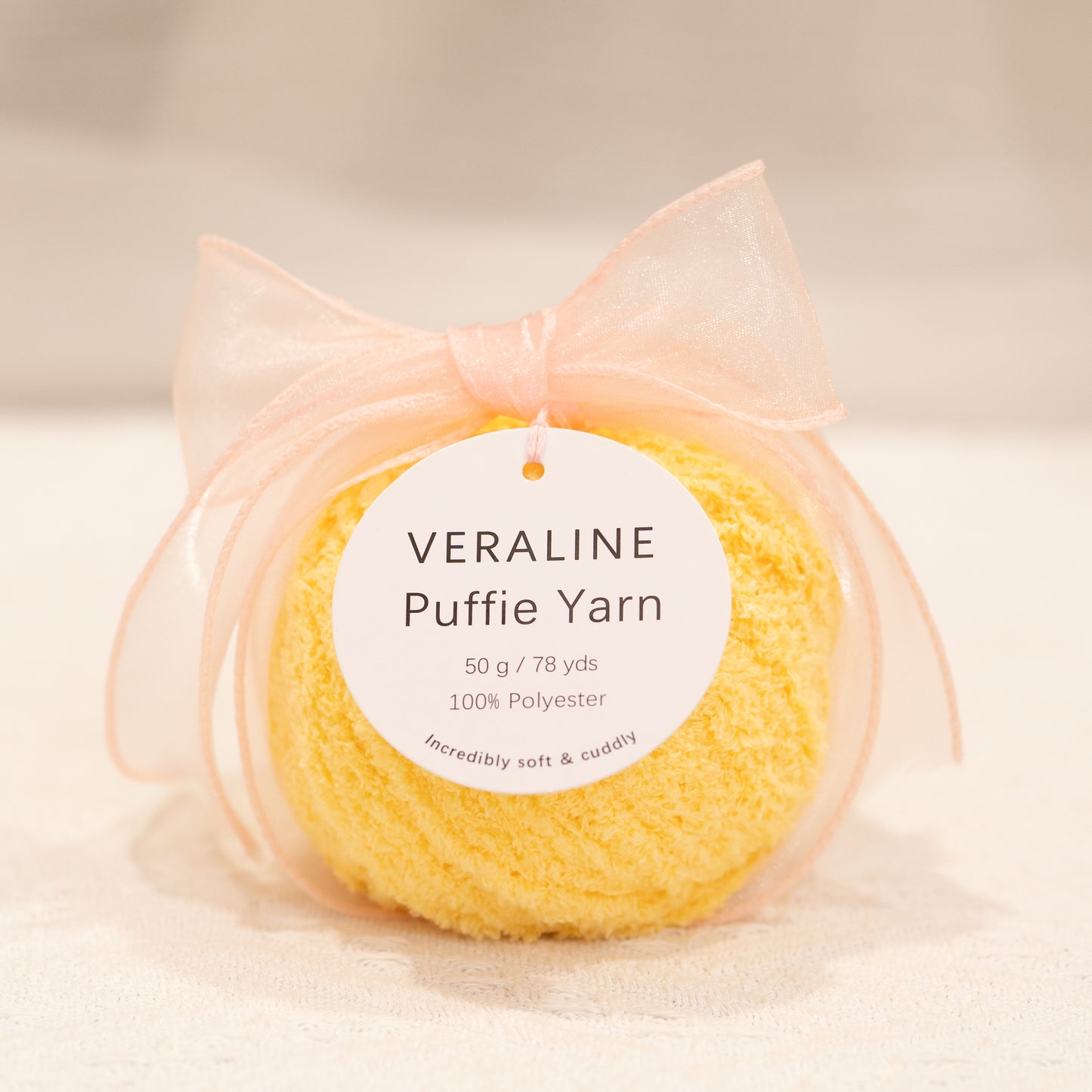 Veraline Puffie Yarn 55 Cantaloupe Cream soft fluffy polyester yarn skein for knitting, crochet, and plush craft projects