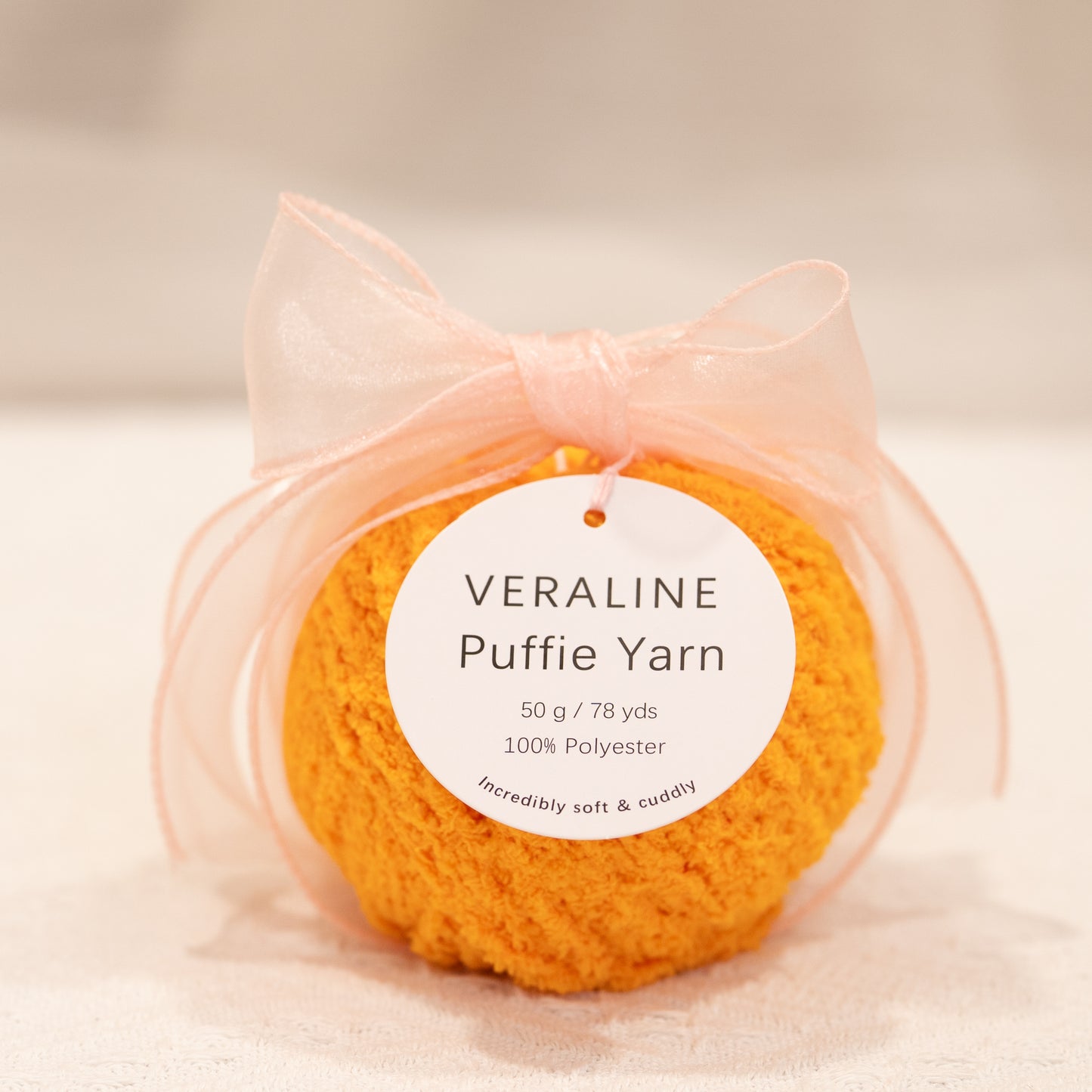 Veraline Puffie Yarn 56 Autumn Pumpkin soft fluffy polyester yarn skein for knitting, crochet, and plush craft projects