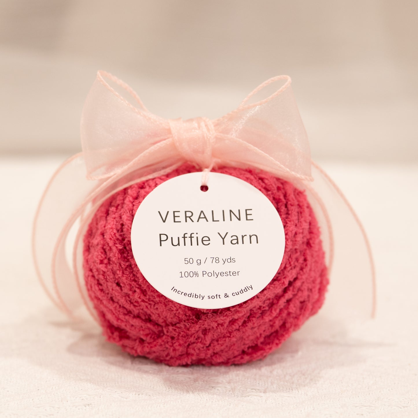 Veraline Puffie Yarn 57 Fuchsia Sorbet soft fluffy polyester yarn skein for knitting, crochet, and plush craft projects